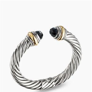 Women’s David Yurman 2 toned black onyx bracelet.